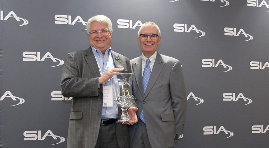 Richard Brent receives the 2017 Chairman's Award from SIA Chairman Denis Hebert at The Advance 2018