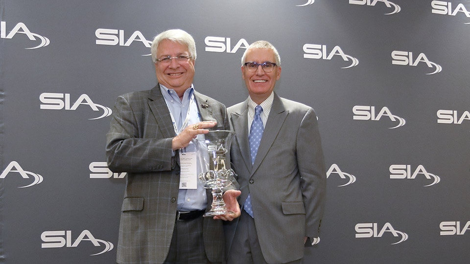 Richard Brent receives the 2017 Chairman's Award from SIA Chairman Denis Hebert at The Advance 2018
