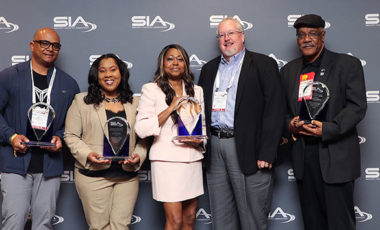 SIA members being honored with the Jay Hauhn Excellence in Partnerships Award at the SIA Market Leaders Reception