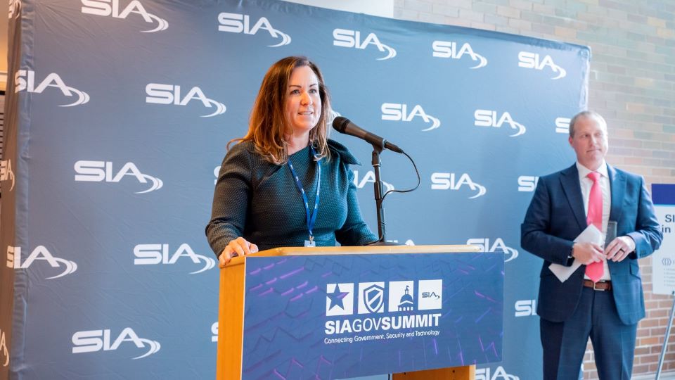 Gena Alexa accepting her award at the SIA GovSummit