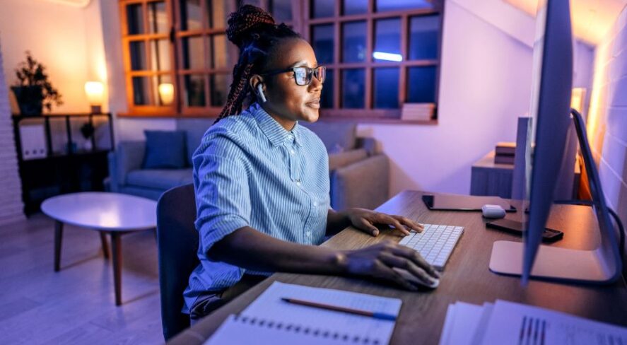 young professional working at computer