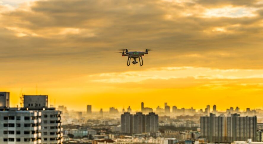 drone flying over city