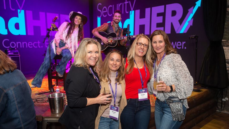 Attendees at Security LeadHER reception