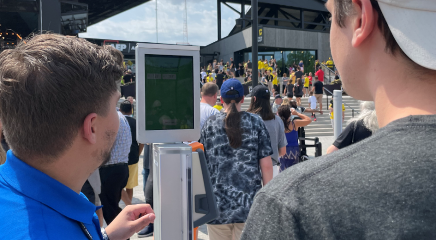 A fan using Wicket facial ticketing at lower.com field