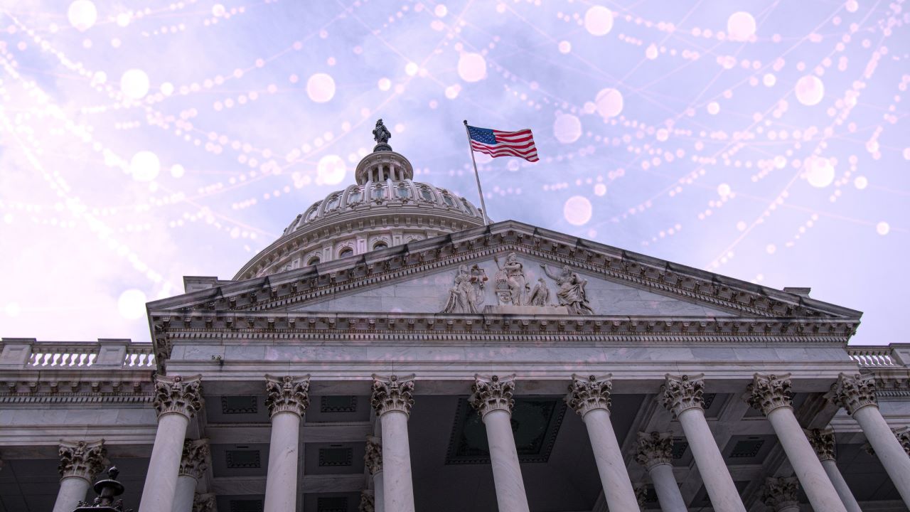 front of government building with American flag and with tech background