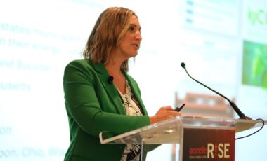 Amy Musanti speaking at AcceleRISE 2024